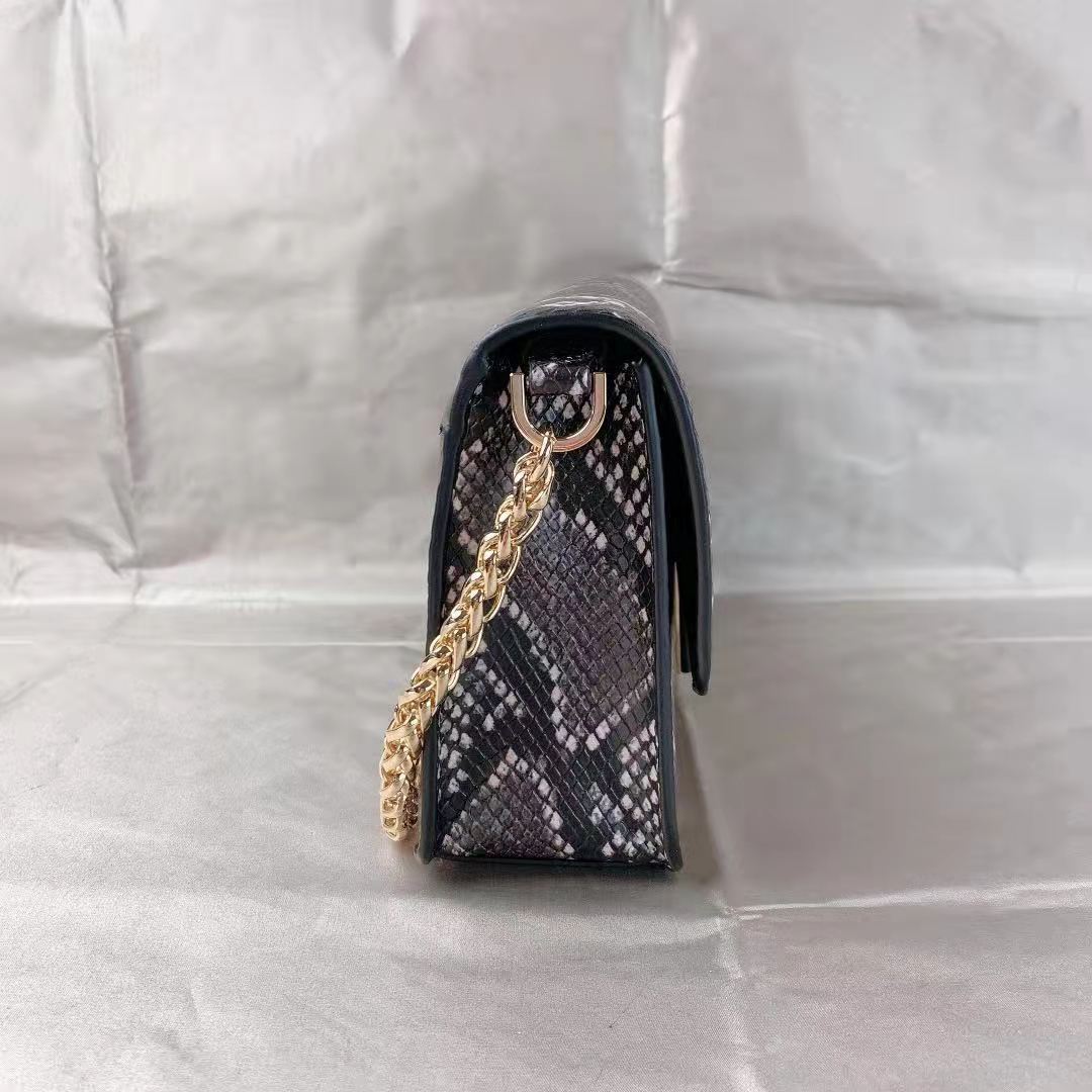 MICHAEL KORS 35F1G6SL3G Sonia Medium Snake Embossed Faux Leather Shoulder Bag In Black MICHAEL KORS 35F1G6SL3G Sonia Medium Snake Embossed Faux Leather Shoulder Bag In Black